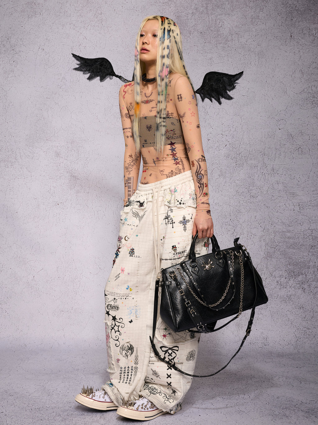TORN SKETCH DISTRESSED SWEATPANTS